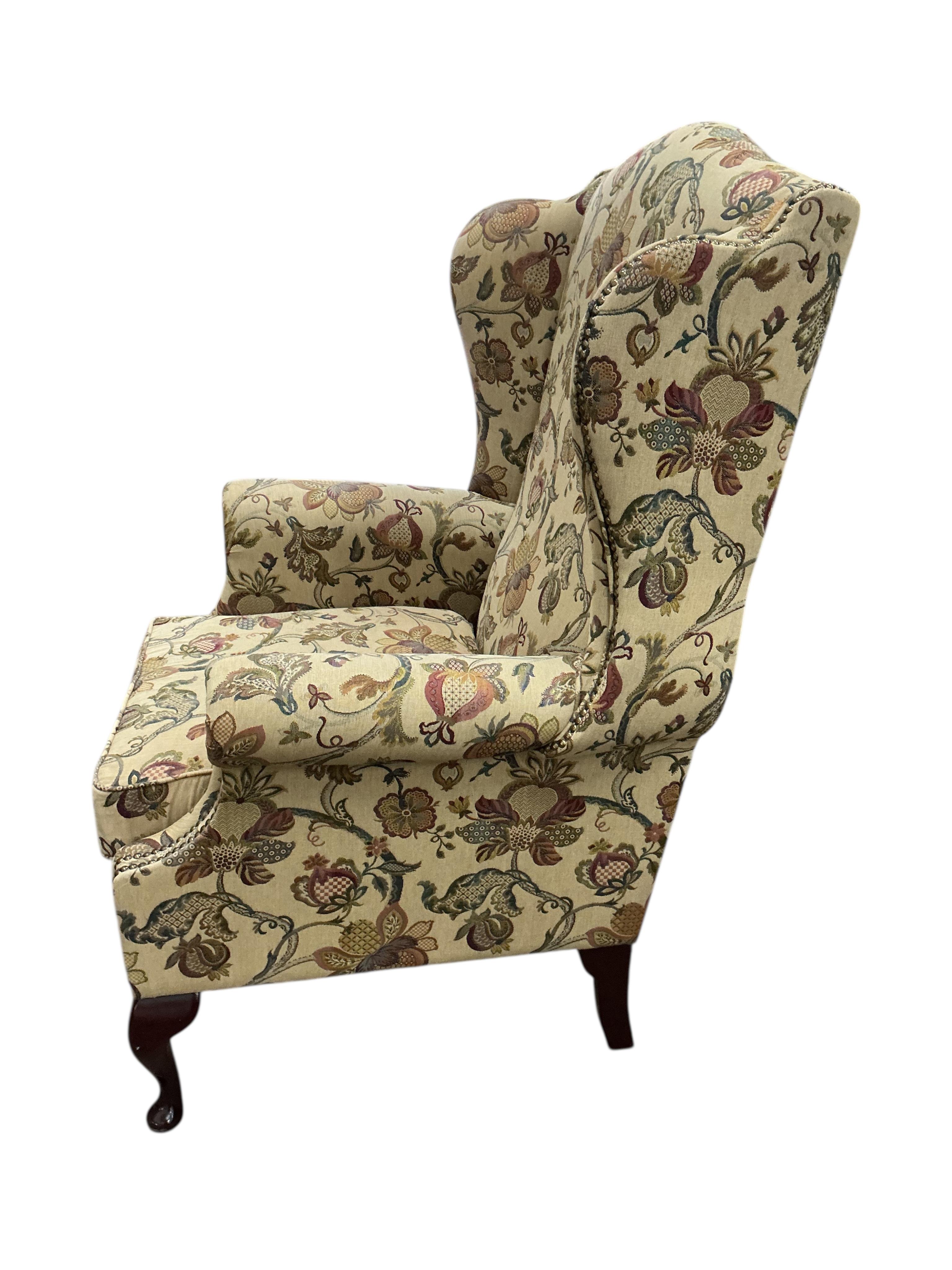 A pair of George III style upholstered wing armchairs, width 80cm, depth 74cm, height 120cm